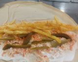 صورة لخطوة 4 من وصفة ساندويش طاووق بطريقه كثير مميزة