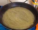 A picture of step 1 of Spaghetti with sausages.