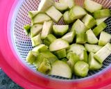 A picture of step 1 of Ridge Gourd(jhinga) Aloo Posto (poppy seeds).