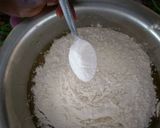 A picture of step 3 of Simple home backed oil cake without an oven.