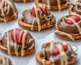 A picture of step 5 of Rolo and Pretzels Christmas treats.