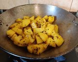 A picture of step 4 of Jeera Aloo (no boiled).