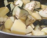 A picture of step 2 of Aloo baingan.