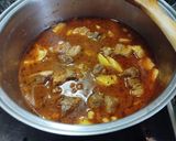 Foto del paso 8 de la receta Patatas guisadas con costillas y garbanzos