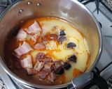 A picture of step 5 of Fabada with Chorizo, Blood Sausage, and Pork Ear in a Pressure Cooker.