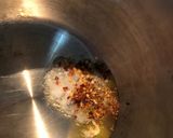 A picture of step 1 of Tomato carrots soup.