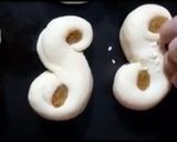 A picture of step 9 of Lussekatter- A Swedish Bun.