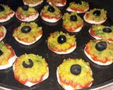 A picture of step 5 of Mini Pizzas with Various Toppings.