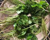 A picture of step 1 of Thankuni Patar Bora (Centella Leaves Pakora / Fritters - Bong style).