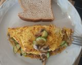 Foto del paso 3 de la receta: Omelette de champiñón y calabacitas