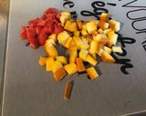 Une image de l'étape 2 de Courgettes aux merguez,tomate et épices.
