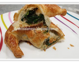 Foto del paso 9 de la receta: Croissants de espinacas, queso de cabra y cebolla caramelizada