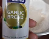 A picture of step 3 of Garlic Bread with fresh basil (no oven bread).