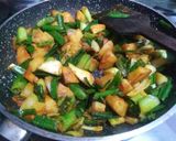 A picture of step 3 of Aloo with Spring Onion.