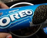 A picture of step 1 of Choco Idli Muffins by Oreo biscuits.