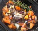 A picture of step 6 of Slow cooked venison shank with chipolatas.