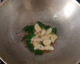A picture of step 2 of Raw Mango Thecha Pulao.