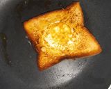 A picture of step 5 of Egg in a nest sandwich.