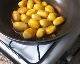 Foto del paso 3 de la receta: Papines con ajo y perejil