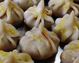 A picture of step 10 of Ukdiche modak.