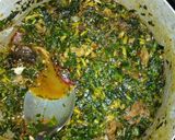 A picture of step 1 of Eba with vegetable soup.