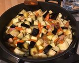 Une image de l'étape 12 de Aubergines, carottes et ciboules au lard et curry.