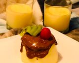 A picture of step 4 of Italian Panna Cotta with Lindt dark chocolate.