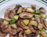 A picture of step 4 of Mushrooms and Zucchini with Herbes de Provence.