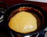 A picture of step 8 of Puri and potato curry.