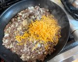 A picture of step 2 of Cheeseburger Spring Rolls.