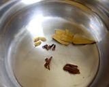 A picture of step 1 of Broken wheat veg biryani.