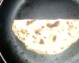 A picture of step 6 of Tortilla egg wrap.