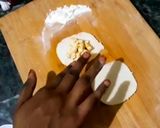 A picture of step 9 of Italian panner ravioli with pink sauce.