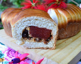 Foto del paso 7 de la receta: Pan "ovillo de lana" relleno con membrillo, pasas de uva y maní💜