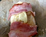 A picture of step 3 of My Chicken breast with Brie and Streaky bacon wrapped around. 😋.