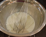 A picture of step 2 of Vanilla Layer Cake with Lemon Cream Filling and Lemon Whipped Cream Frosting.