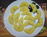 A picture of step 5 of Coconut Chandrapuli.