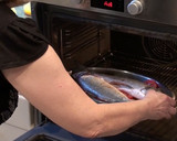 Foto del paso 4 de la receta: Lubina al horno con patatas