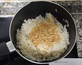 Foto del paso 5 de la receta: Arroz almendrado con anillos de calamar rebozados