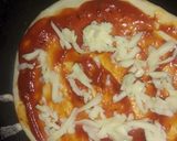 A picture of step 6 of Mini pizza.