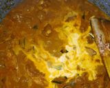 A picture of step 15 of Spicy coconut milk chicken curry.