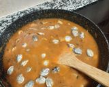 Foto del paso 8 de la receta: Calamares con tomate, almejas y gambas