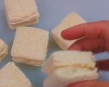 A picture of step 6 of No Cook Bread Sweet Sandwich.