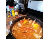A picture of step 3 of Cajun seafood and crab boil.
