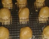 A picture of step 7 of Both Peanut Butter and Chocolate Hazelnut Cheesecake Cookies .