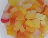 A picture of step 1 of Cocktail Fruit Cream Salad 😋🥗.