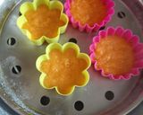 A picture of step 2 of Tricolor cup cake dhokla.