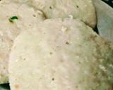 A picture of step 2 of Steamed Idli with chutney and sambar.