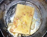 A picture of step 2 of Fried Bread with Egg.