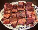 A picture of step 1 of California Farm Goat Chops with Pine Nuts.